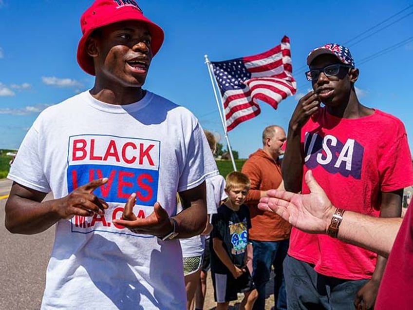 A supporter of the US president wears a "Black Lives MAGA" t-shirt on August 17, 2020 in M