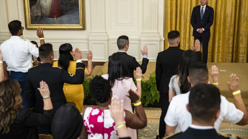 Biden attends US citizenship ceremony. 