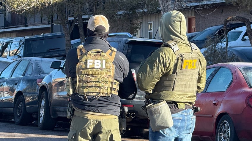 Two FBI agents side-by-side in Denver