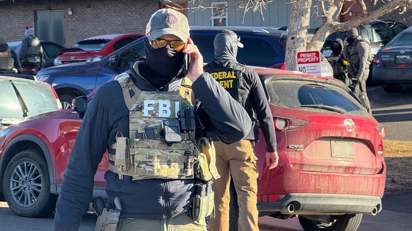 FBI agent on phone in Denver