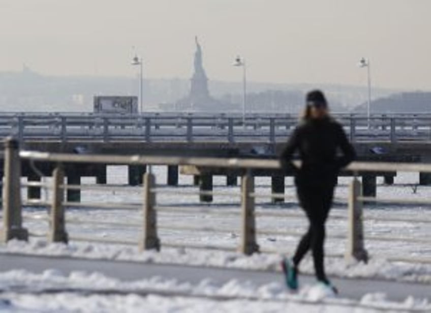 In many parts of U.S., cold hangs on but warmer temps on the way