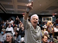 In New York, a GOP congressman is shelled with questions about Trump during raucous town hall