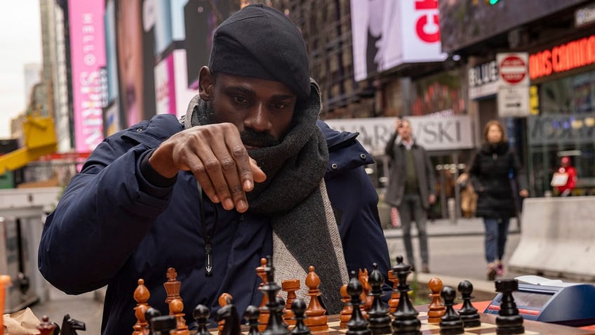 man playing chess