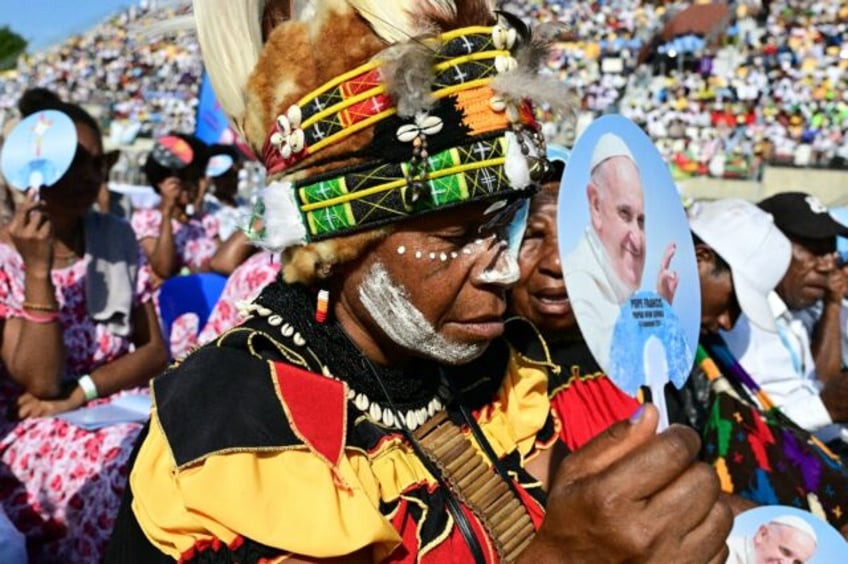 Pope Francis is leading holy mass at the Sir Guise Stadium during his four day visit to Pa