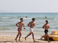 In shadow of war, Lebanese find respite on southern beach