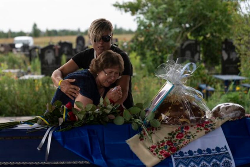 in ukraine a familys ordeal to identify and honor a veteran killed in bucha ends after 16 months