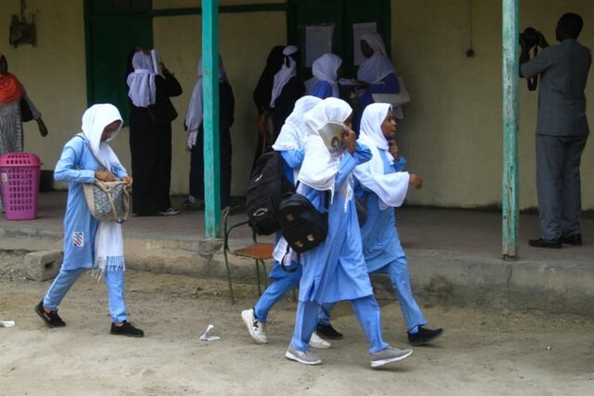 Students arrive for exams in Port Sudan on December 28, 2024 -- even before the country's