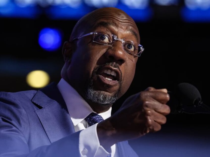 CHICAGO, ILLINOIS - AUGUST 19: Sen. Raphael Warnock (D-GA) speaks onstage during the first