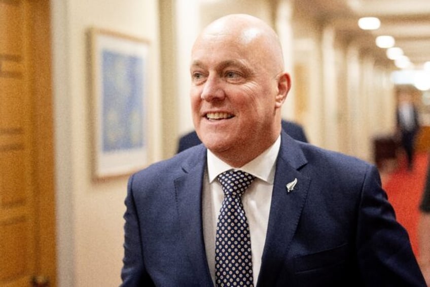 incoming new zealand pm forms three party coalition govt