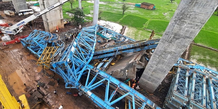 india crane collapse at highway construction site kills 16 injures several others