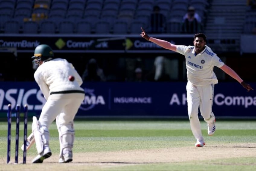 India's Harshit Rana celebrates the last wicket of Alex Carey