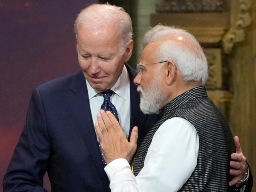 U.S. President Joe Biden, left, and India Prime Minister Narendra Modi talks during the G20 leaders summit in Nusa Dua, Bali, Indonesia, Nov. 15, 2022. Biden has made it a mission for the U.S. to build friendships overseas, and the next few weeks will offer a vivid demonstration of the importance he’s placing on a relationship with Modi. (AP Photo/Dita Alangkara, Pool, File)
