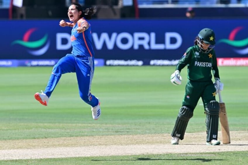 Renuka Singh (in blue) made the breakthrough for India in the first over of their T20 Worl