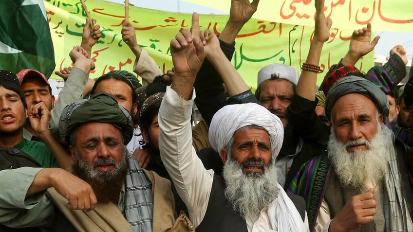 Afghan refugees living in Pakistan rally against India in Lahore, Pakistan, Feb. 28, 2019. (AP Photo/K.M. Chaudary)