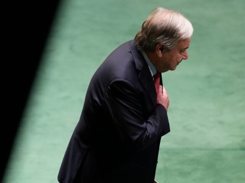 United Nations Secretary-General António Guterres puts his hand over his heart after spea