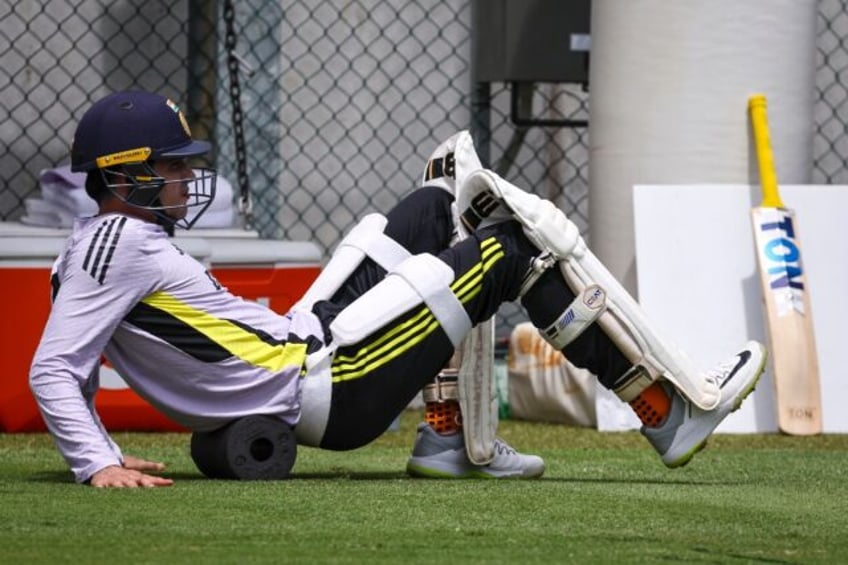 India's Shubman Gill stretches during a training session at The Gabba in Brisbane