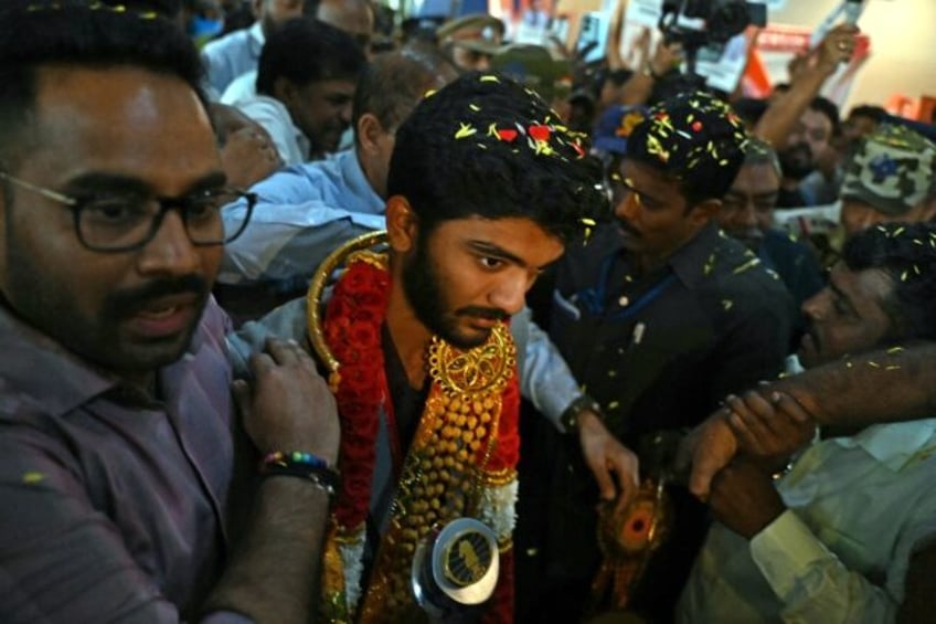 India's Gukesh Dommaraju returned to a hero's welcome in his home city on Monday