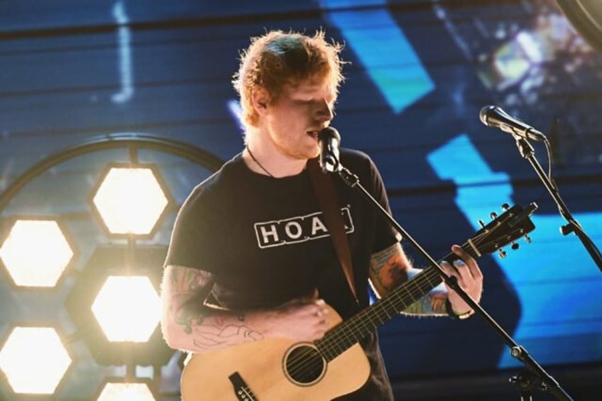 Popstar Ed Sheeran has denied that he unlawfully busked after police terminated a street p