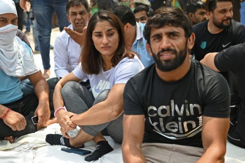 Indian wrestler Bajrang Punia (front, right) took part in protests against the Wrestling F