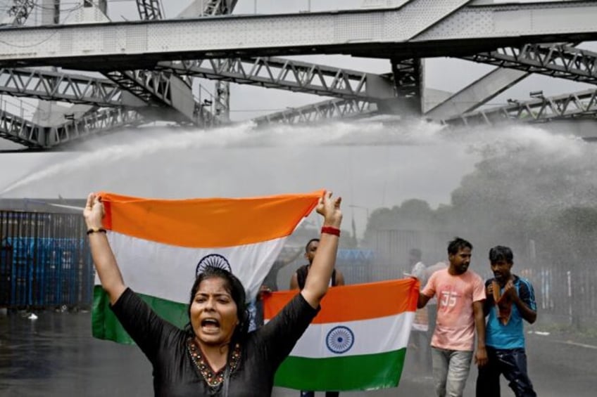 Indian police on Tuesday used water canons in Kolkata, as demonstrations seeking justice f