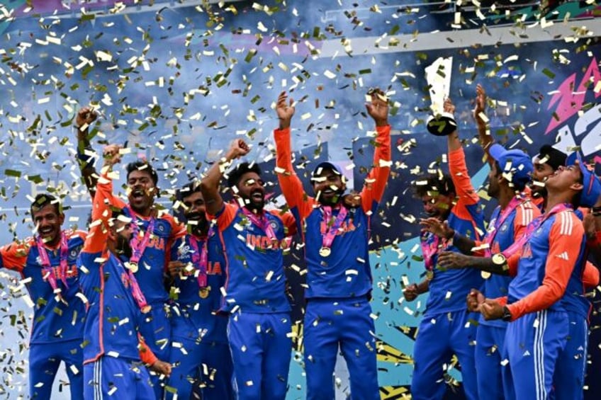 The Indian team celebrate after winning the ICC men's Twenty20 World Cup 2024 final