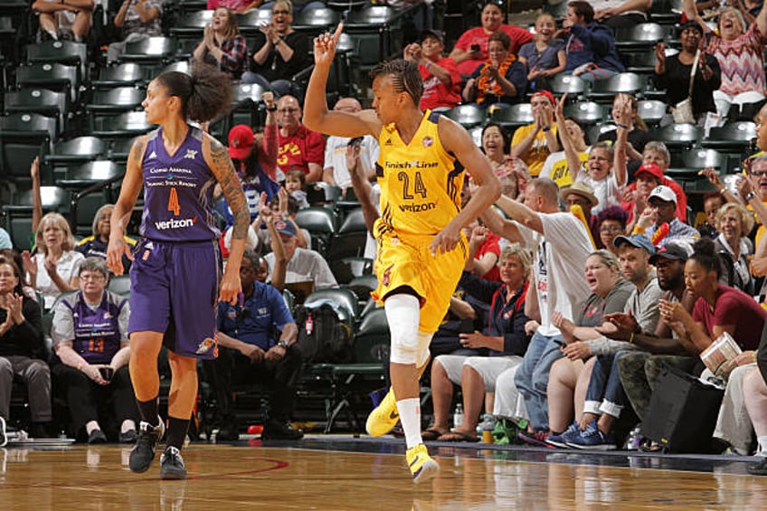 Tamika Catchings of the Indiana Fever celebrates against the Phoenix Mercury during Round One of the 2016 WNBA Playoffs on September 21, 2016 at...