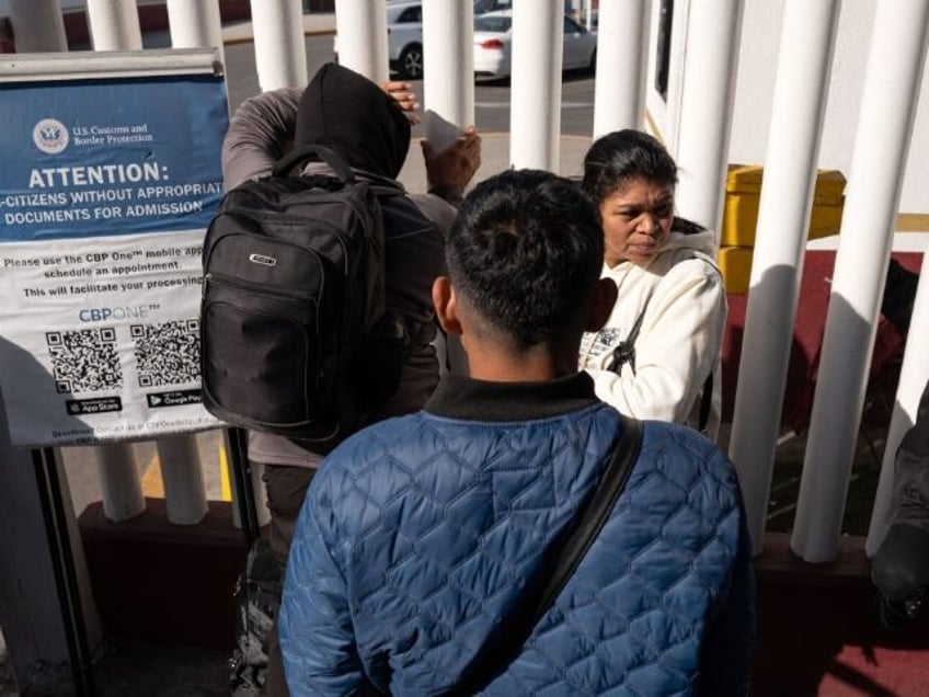 Asylum seekers wait for news on their CBP One appointments with US authorities before cros