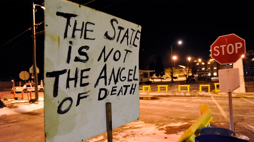 A sign placed by death penalty opponents
