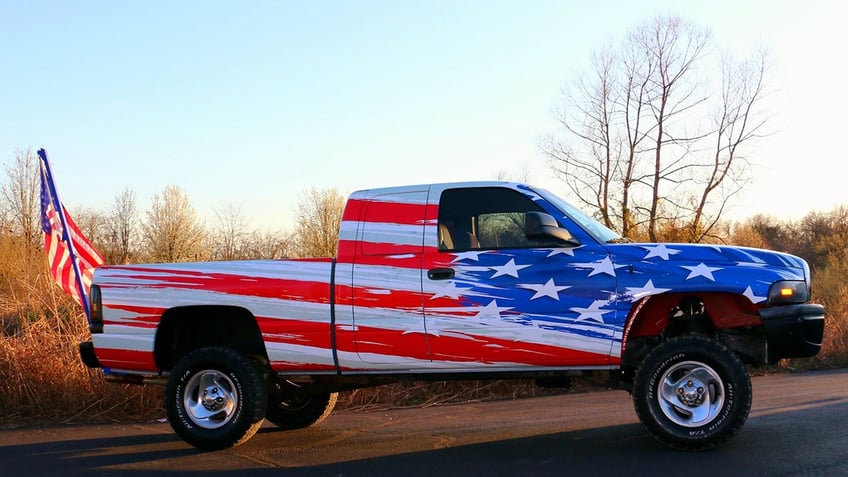 Cameron Blasek's pickup truck, with an American flag wrap