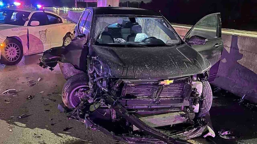 wrecked SUV at accident scene