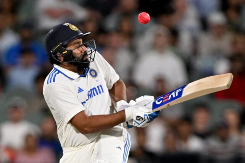 indias adelaide drubbing puts subdued rohit under scrutiny