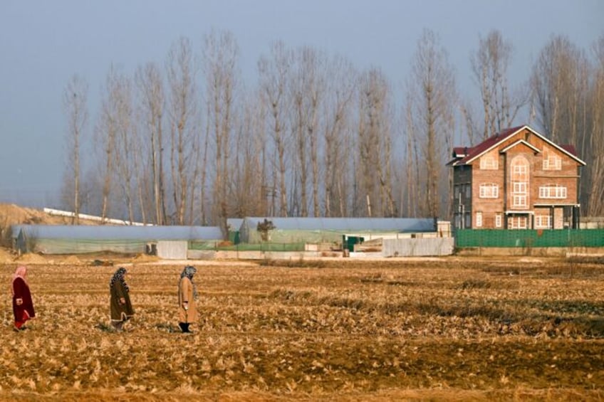 Farmers in Indian-administered Kashmir say a major government infrastructure drive is taki