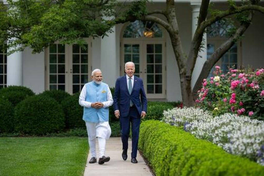 indias modi meets biden us screw turners squirm some more