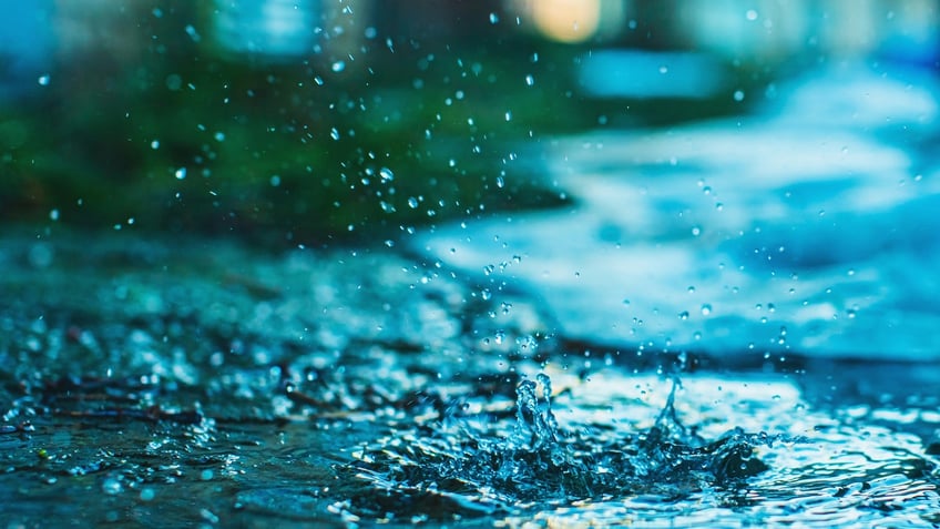 Raindrop falling on ground