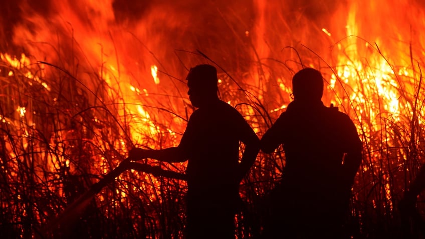 indonesia battles peatland fires on sumatra officials assure limited regional impact