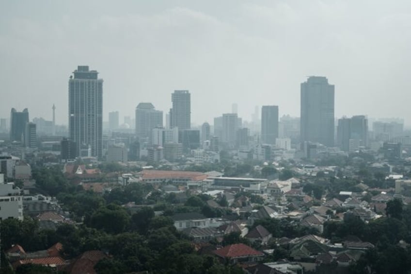 indonesia capital hit by major pollution spikes monitor