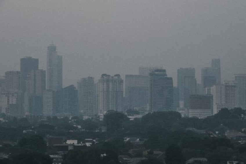 indonesia halves output at coal power plant as pollution spikes