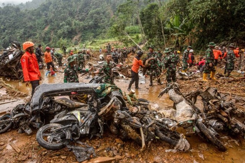 The death toll from a landslide in Indonesia rose to 25 as rescuers found three more bodie