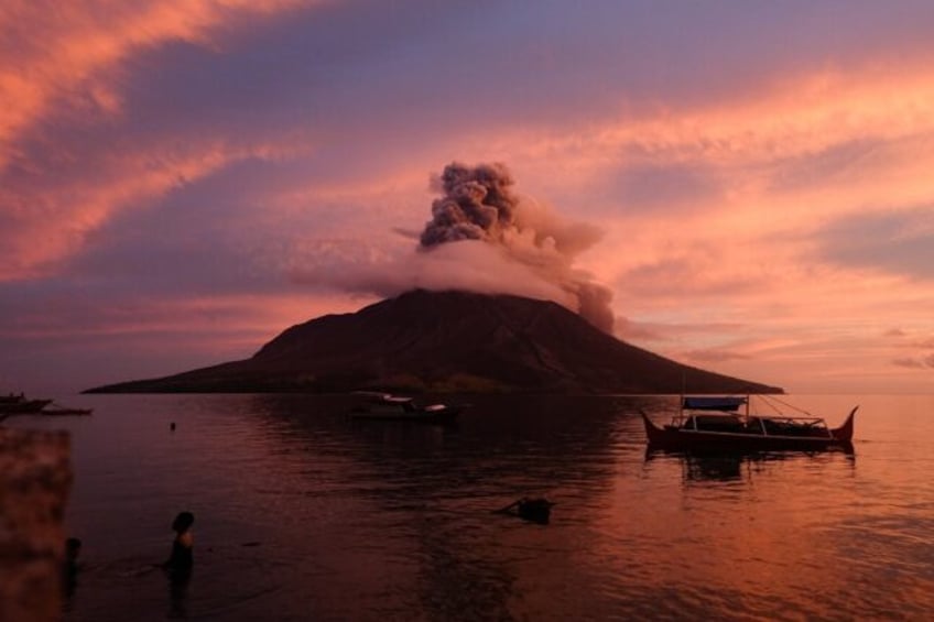 Volcanic activity has calmed at the crater and the country's volcanology agency lowered th