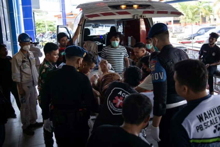 A Chinese worker injured in the explosion at an Indonesian nickel smelter furnace is taken to hospital