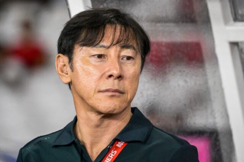 Shin Tae-yong looks on during a World Cup qualification match against Saudi Arabia