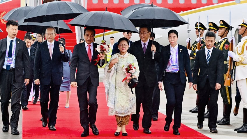 indonesian president joko widodo arrives in china for meeting with xi jinping