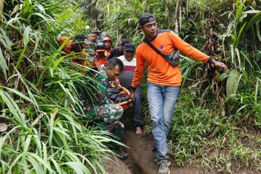 indonesian rescuers race to find 12 missing after eruption