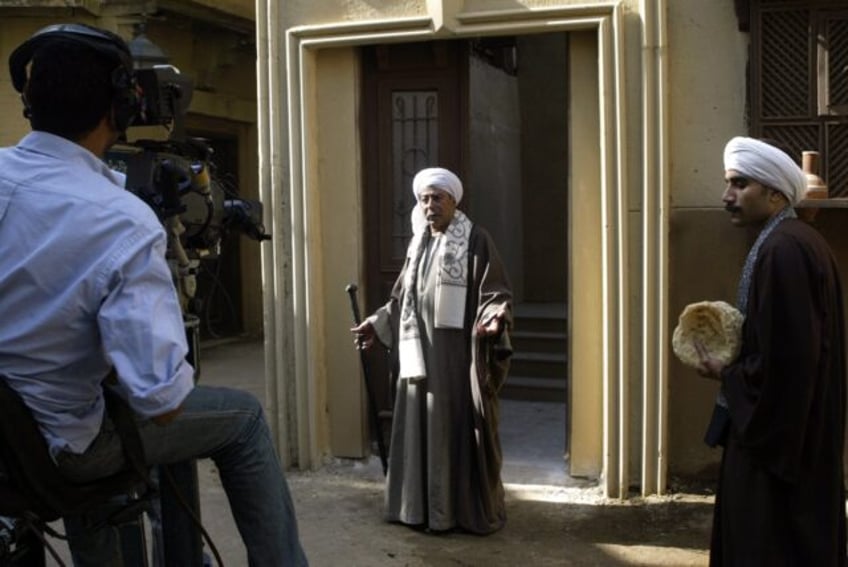 During filming in 2006 at Cairo's Al-Ahram Studio, Salah al-Saadani performs in the Ramada