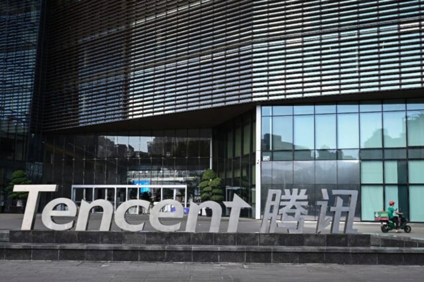 Shares in Tencent sank more than seven percent in Hong Kong after it was added to a US lis