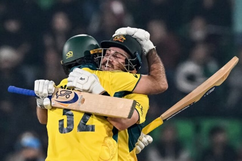 Chase masters: Australia's Josh Inglis (R) celebrates with teammate Glenn Maxwell after re