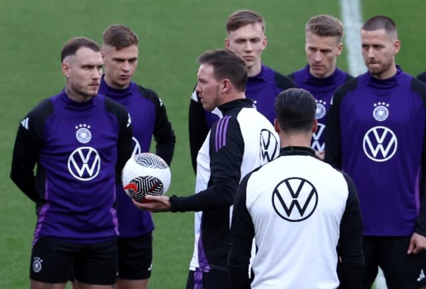 Listen and learn: Germany coach Julian Nagelsmann speaks to his players during a training