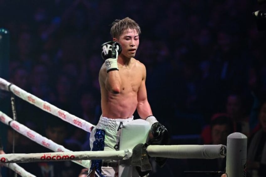 Japan's Naoya Inoue became an undisputed world champion at a second weight on Tuesday after knocking out Marlon Tapales in the 10th round