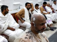Inside Saudi’s hajj-only barbershop, shaving thousands of heads in a day