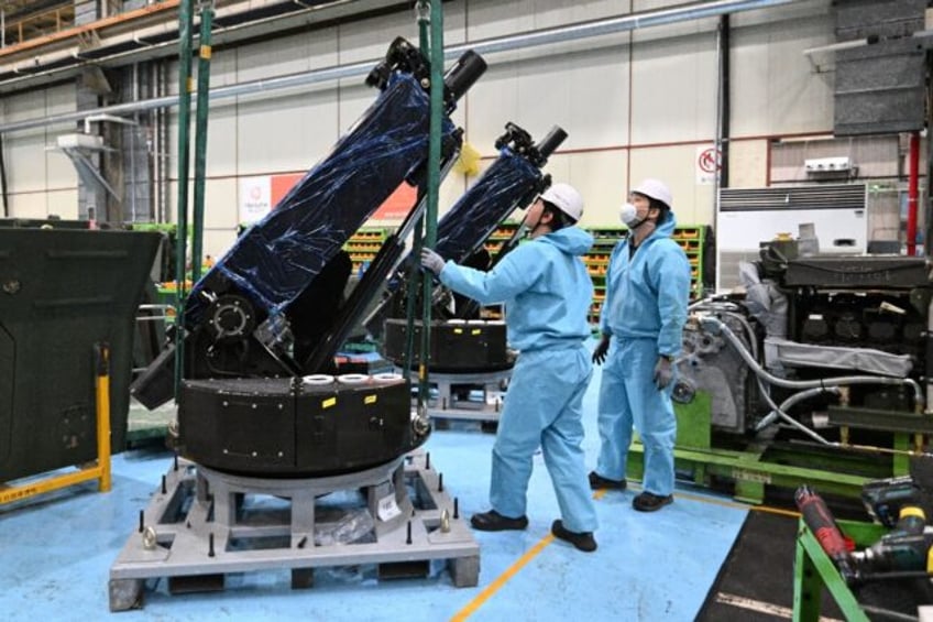 South Korean engineers work on a 120mm self-propelled mortar at the Hanwha Aerospace facto